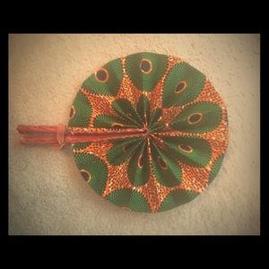 Beautiful leather and cloth fan.